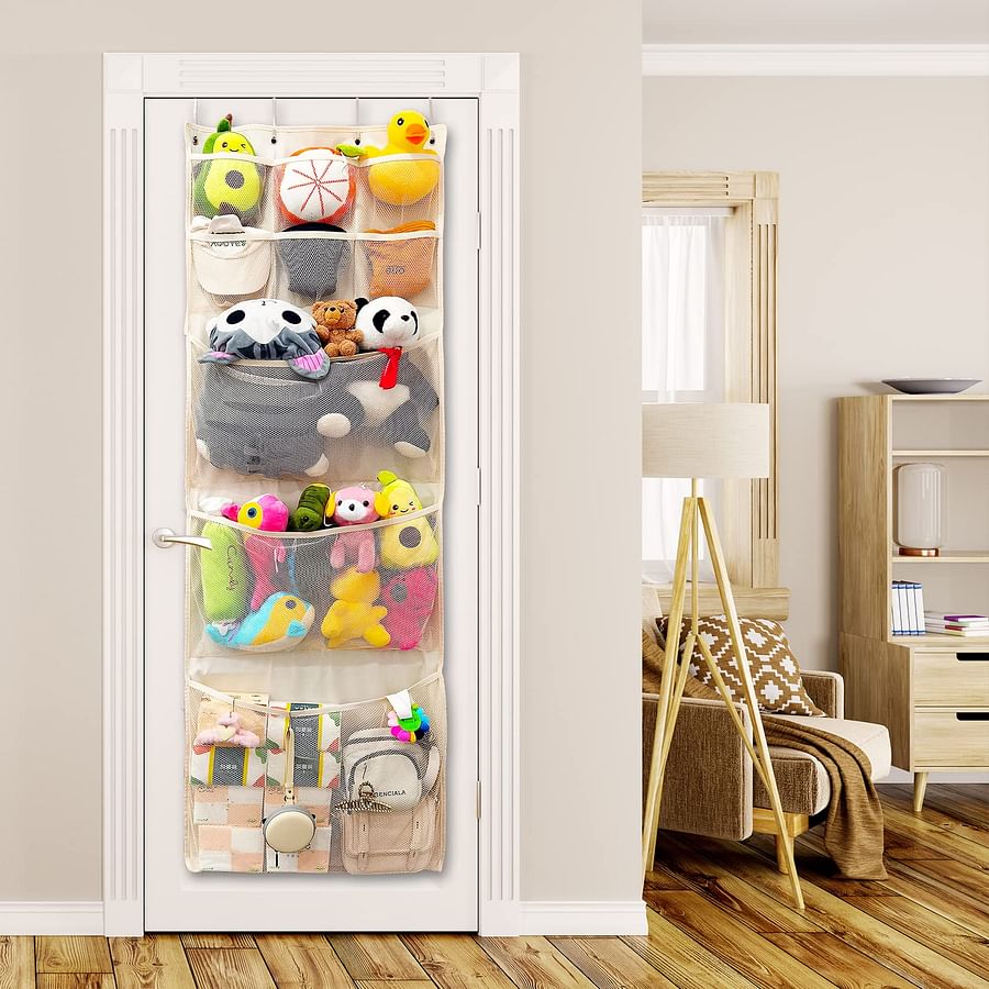 Over-the-door organizer filled with various small toys in a child\'s room